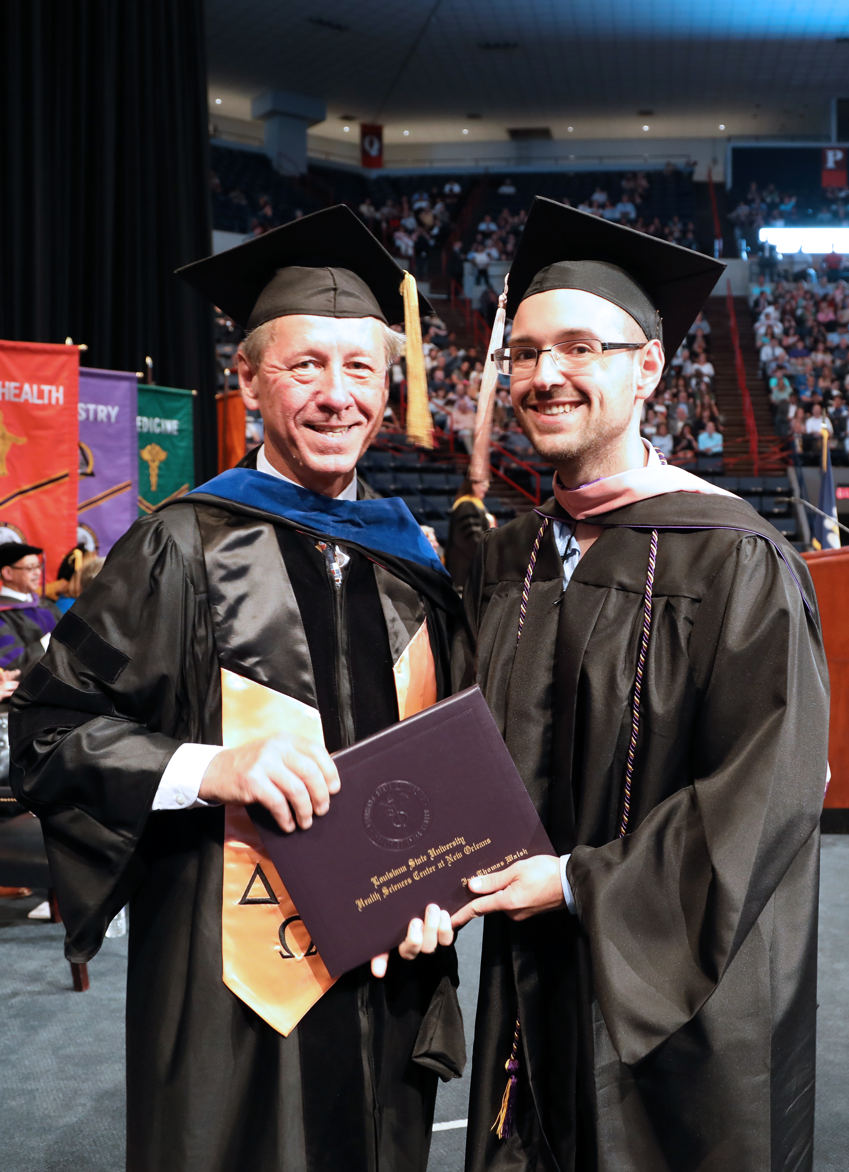 relative presenting diploma